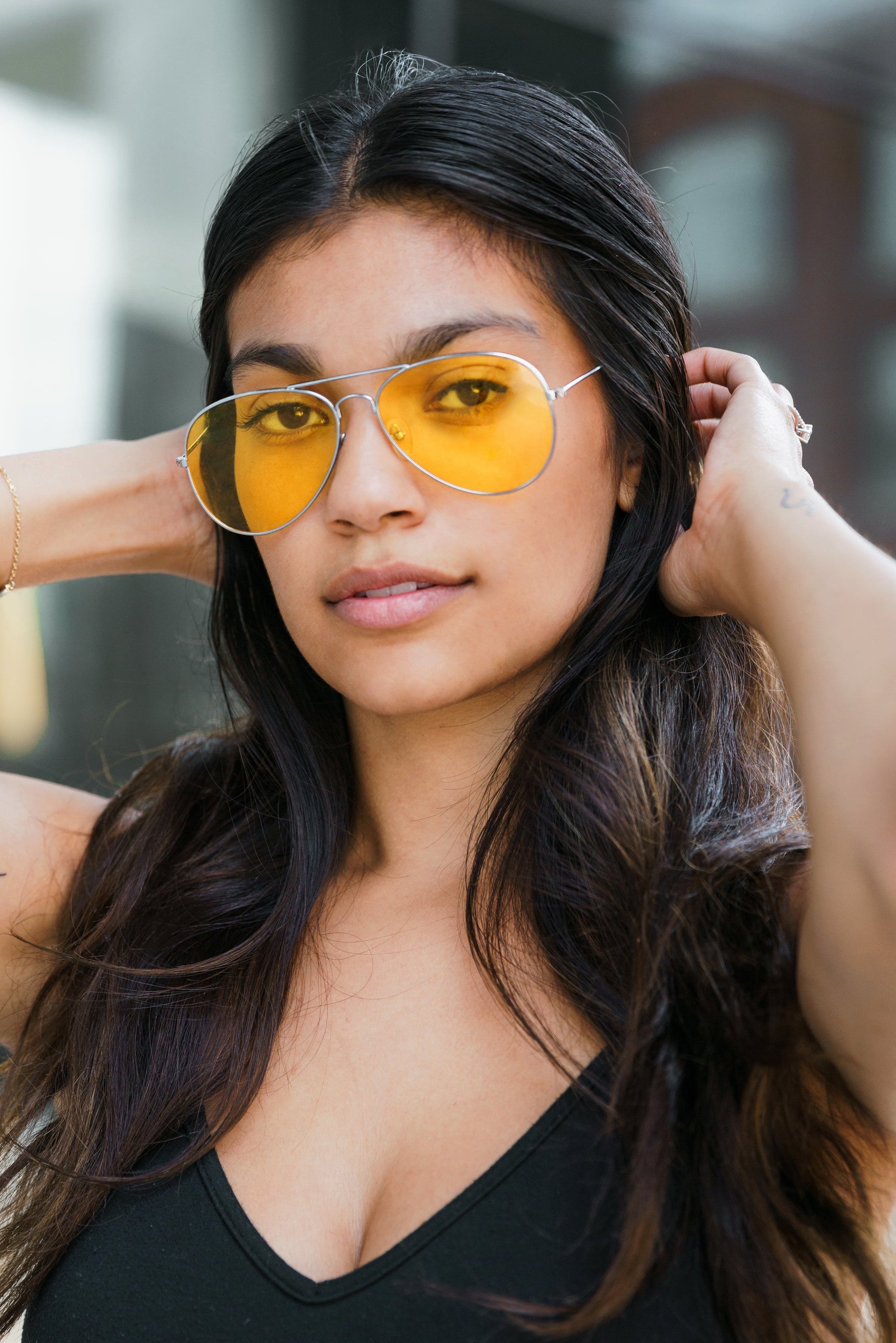 files/woman-wearing-aviator-glasses_0e464167-784d-4ecd-8ffe-de090477eff9.jpg